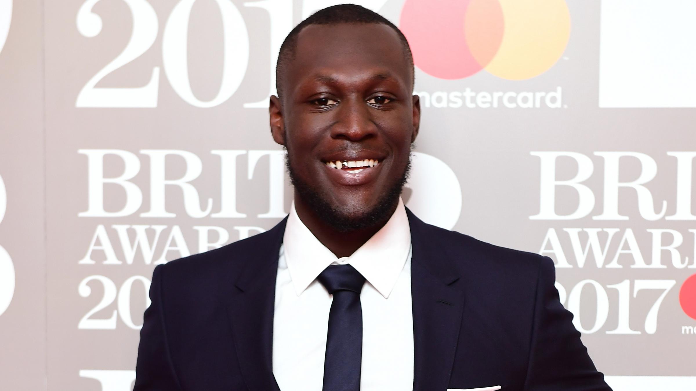 Grime King Stormzy Heads To Old Trafford For Debut Album Gang Signs Prayer Signing Messenger Newspapers